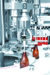 China 2500 BPH Semi Automatic Bottle Capping Machine factory
