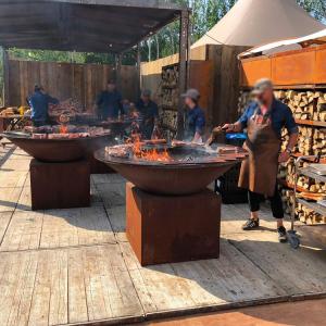 China Wood Charcoal Burning Rust Corten Steel BBQ Grill for Outdoor Cooking factory