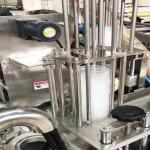 Auto Rotary Cup Filling Sealing Machine Spoon Honey Cup Filling Plastic Packing