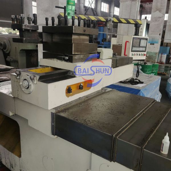 China High Precision Heavy Flange Surface Grinding Lathe For Auto Wheel With 2 Years Warranty factory