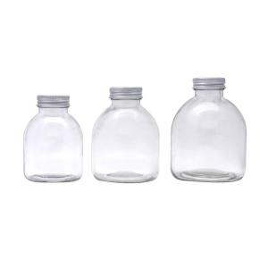 China 300ml 500ml Capacity Glass Beverage Bottles factory