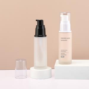 China 30ml Frosted Glass Liquid Foundation Bottles With Pump Round Shape factory