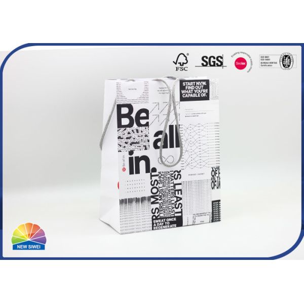 China Custom Print Paper Shopping Bags With Cotton Ropes For Clothes factory