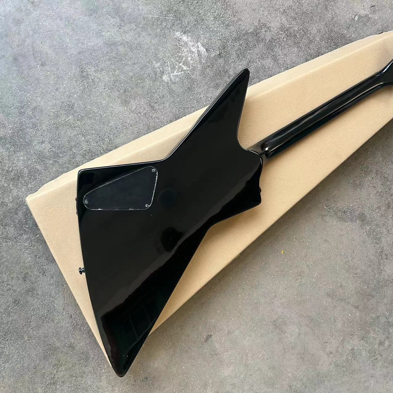 Custom special shape body ESP style electric guitar in black color glossing finish