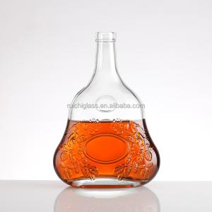 China 700ml Clear Spirit Glass Bottle Unique Design for Brandy Base Material Super Flint Glass factory