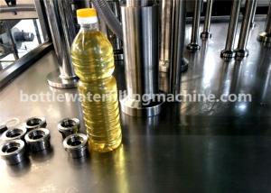 China 3000BPH Soybean Oil 1L Plastic Bottle Filling And Capping Machine 2-In-1 factory