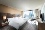Krong Kep hotel guestroom used furniture double bed with Tv cabinet and Living