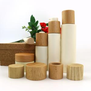 China Custom Round Cosmetic Bottle Caps Non Spill Cream Bottle Wooden Lid factory