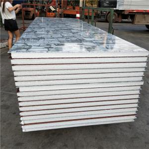 China EPS sandwich wall panel 1150-50-0.426mm sandstone steel sheet up and wood grain down factory