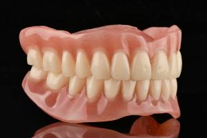 China Secure Fit Acrylic Dental Removables Prosthesis Artificial Acrylic Teeth Adjustable factory