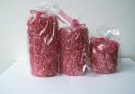 Red & Pearl scented pillar candle wrapped by lots of rose packed into gift bag