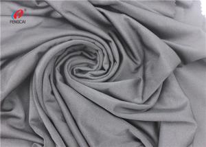 China Warp knit bright pink fabric polyamide elastane fabric nylon spandex swimwear sportswear fabric factory