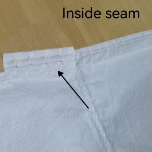 China Microporous Nonwoven Uniform Waterproof Lab Coat For Doctors Nurses 117 X 135cm factory