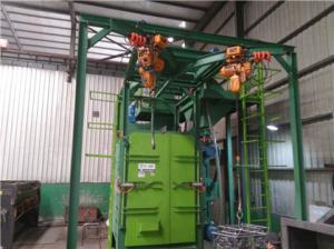 China CE Hanging Chain Conveyor Shot Blasting Machine For Cleaning Alloy Wheels factory