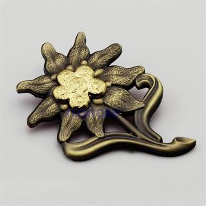 China Customized three-dimensional flower metal OEM, high-end furniture brand badges, edelweiss antique badge factory