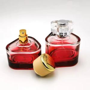 China 50ml 100ml Empty Perfume Bottle Red Luxury Triangles Perfume Spray Bottle factory
