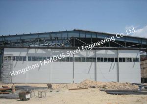 China Multi Sector Structural Hinged Doors Bottom Roller Sliding Hangar Door Smart Track Design factory