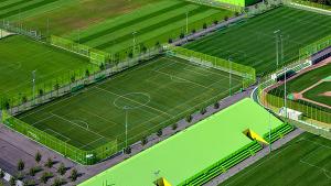 China Quartz Sand Infill Material Artificial Football Pitches 8-10 Years Life Span 50mm Pile Height factory
