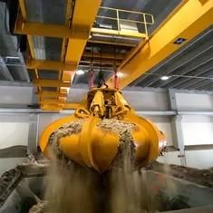 China Electric Double Girder Overhead Crane 15ton Of Multi Flap Hydraulic Grabs factory