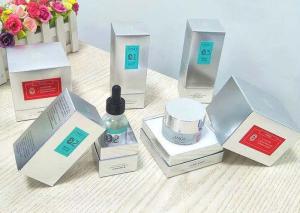 China Factory supplying customized silver paper cosmetics essence packaging boxes factory