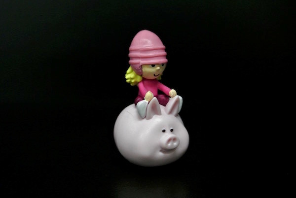 One Inch Height Plastic Toy Figures A Girl With Pinky Hat On A Pig As Tumbler