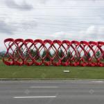 Large Stainless Steel Light Sculpture With Red Painted Surface For Outdoor