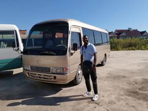 China 30 Seater Toyota Coaster Bus Japanese Mini Bus Open The Door Outside factory