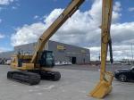 Excavator extension arm for foundation pit, caisson, basement excavation