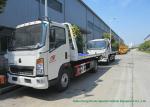 HOWO Light Duty Flatbed Tow Truck Carrier For Car / SUV Road Recovery 3 - 5 Ton