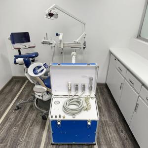 China Mobile Dental Clinic Portable Air Turbine Hand Held Dental Treatment Unit 550W Mobile Dental Delivery Unit factory