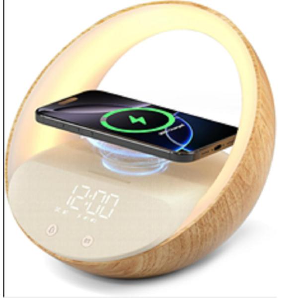 China Multifunctional Wireless Charging Speaker Bluetooth Connectivity Built-in LED Lights And Alarm Clock For Families factory