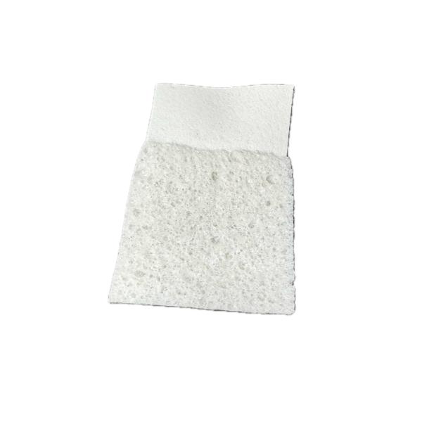 White compressed cellulose sponge for kitchen cleaning