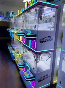 China New Net Red Coin Commercial Doll Grabbing Machine Fully Transparent 220V factory