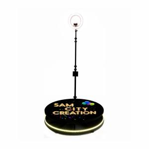 China Black Spinning 360 Photo Booth Machine Rotating Platform With Ring Light factory