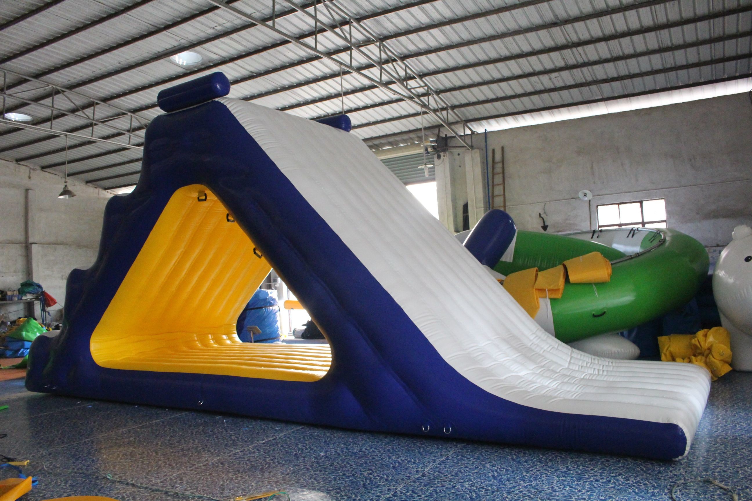 Customized Sea Or Lake 0.9mm Fireproof Inflatable Water Park Climbing Wall Slides