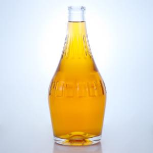 China Industrial Liquor Glass Bottle with Custom Embossed Body and Cork Stopper factory