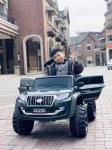 Style 2.4GHz Remote Control Ride On Car With MP3 and Open Doors for Kids