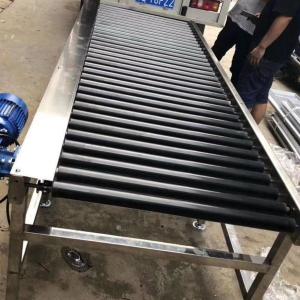 China Transport Vertical Chain Conveyor Pneumatic Vacuum Feeder Conveyor factory