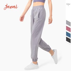China Quickdrying Zipper Pockets Yoga Jogger Pants 130gsm Yoga Sweatpants Plus Size factory