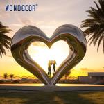 Large outdoor square modern abstract geometric hollow heart-shaped stainless
