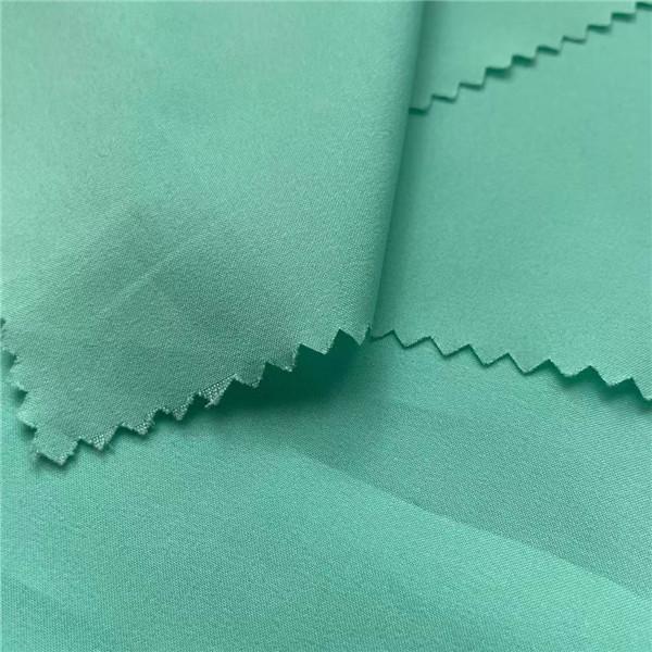 50D 50D Woven 60GSM Athletic Spandex Fabric 100 Polyester Fabric Green 150cm