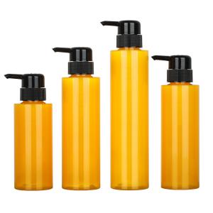 China Customized PET Round Lotion Pump Shampoo Bottle Cylinder Yellow color factory