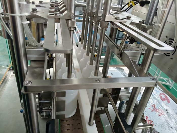 Pesticide Filling Machine for 500-1500ml Plastic/Glass Bottles with No-Bottle No-Fill, No-Cap, No-Stop, Drip Protection, Automatic Alarm, and Shutdown