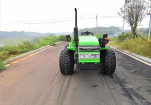 China 35HP Small Turning Radius 4wd quad tractor For orchard oil palm plantation floatation tyres all terrain vehicle factory