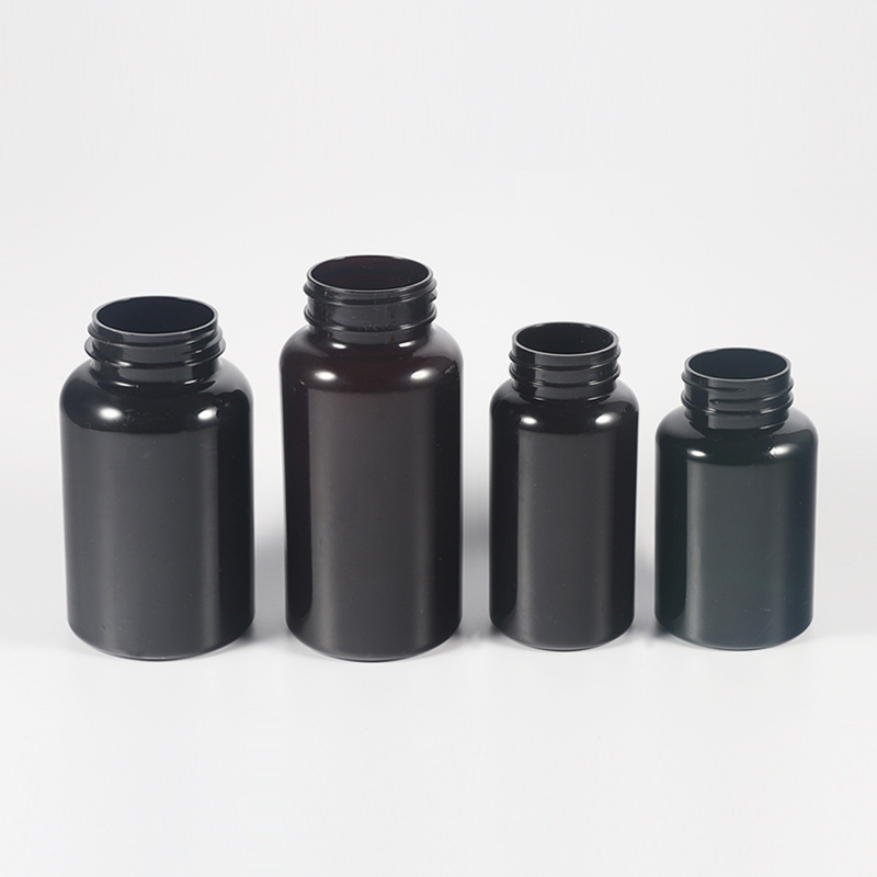 Highly Customized 4oz PET Capsule Bottle of Orange Black Plastic Nutrition Supplement with Purple Tamper Proof Packaging