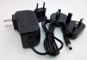 China Interchangeable ac plug 12V 2A 1A 5V 2A 12v 5a power adapter with USA/Australia/Europe/UK plug dubai for LED .SET TOP factory