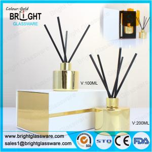 China high quality glass gold reed diffuser bottle with gift box factory
