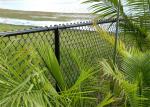 Chain wire fence protects and decorates garden and sports yard