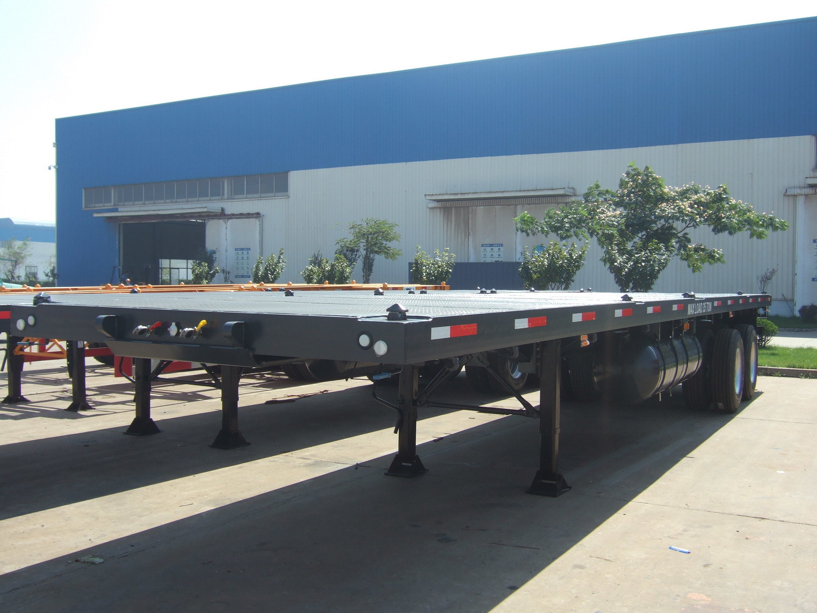 Common Mechanical Suspension 2 Axles Platform Trailer Flat Bed Semi Trailer WEORES6641A