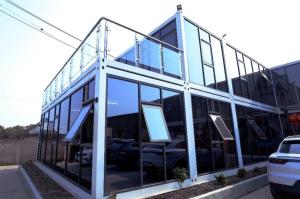 China Sustainable Flat Pack Container House Building Office Beautiful Fashion factory